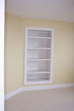 In-wall shelving in a small room