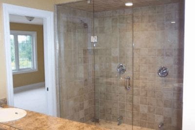 Large glass wall shower in a bathroom