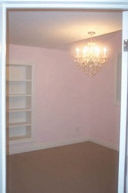 Small empty room with chandelier
